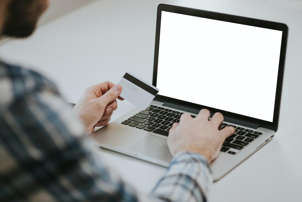 man shopping online. Empty laptop screen template